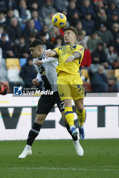 2023-12-03 - Tomas Suslov of Hellas Verona FC battle for the ball with Martin Payero of Udinese FC  during Udinese Calcio vs Hellas Verona FC, 14° Serie A Tim 2023-24 game at Bluenergy Stadium - Stadio Friuli in Udine (UD), Italy, on Dicember 03, 2023. - UDINESE CALCIO VS HELLAS VERONA FC - ITALIAN SERIE A - SOCCER