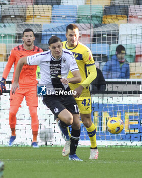 2023-12-03 - Lorenzo Lucca of Udinese FC  play the ball during Udinese Calcio vs Hellas Verona FC, 14° Serie A Tim 2023-24 game at Bluenergy Stadium - Stadio Friuli in Udine (UD), Italy, on Dicember 03, 2023. - UDINESE CALCIO VS HELLAS VERONA FC - ITALIAN SERIE A - SOCCER