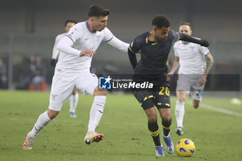 2023-12-09 - Cyril Ngonge of Hellas Verona FC competes for the ball with Nicolò Casale of SS Lazio  during Hellas Verona FC  vs SS Lazio, 15° Serie A Tim 2023-24 game at Marcantonio Bentegodi Stadium in Verona (VR), Italy, on Dicember 09, 2023. - HELLAS VERONA FC VS SS LAZIO - ITALIAN SERIE A - SOCCER