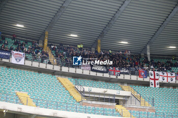 2023-12-23 - Cagliari fans show their support during Hellas Verona FC  vs Cagliari Calcio, 17° Serie A Tim 2023-24 game at Marcantonio Bentegodi Stadium in Verona (VR), Italy, on Dicember 23, 2023. - HELLAS VERONA FC VS CAGLIARI CALCIO - ITALIAN SERIE A - SOCCER