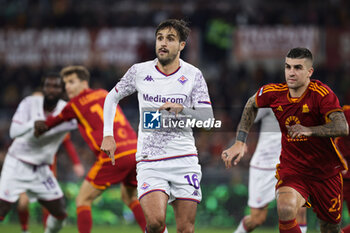 2023-12-10 - Luca Ranieri of Fiorentina and Gianluca Mancini of Roma in action during the Italian championship Serie A football match between AS Roma and ACF Fiorentina on December 10, 2023 at Stadio Olimpico in Rome, Italy - FOOTBALL - ITALIAN CHAMP - ROMA V FIORENTINA - ITALIAN SERIE A - SOCCER