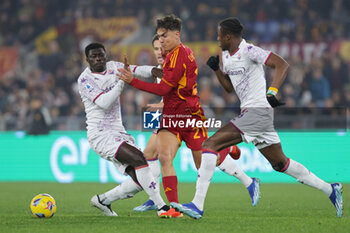 2023-12-10 - Paulo Dybala of Roma vies for the ball with Alfred Duncan during the Italian championship Serie A football match between AS Roma and ACF Fiorentina on December 10, 2023 at Stadio Olimpico in Rome, Italy - FOOTBALL - ITALIAN CHAMP - ROMA V FIORENTINA - ITALIAN SERIE A - SOCCER