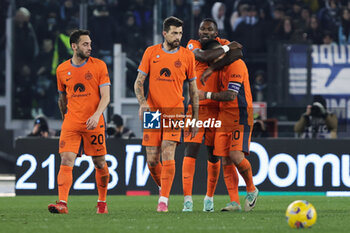 2023-12-17 - Marcus Thuram of Internazionale celebrates with his teammates after scoring 0-2 goal during the Italian championship Serie A football match between SS Lazio and FC Internazionale on December 17, 2023 at Stadio Olimpico in Rome, Italy - FOOTBALL - ITALIAN CHAMP - LAZIO V INTERNAZIONALE - ITALIAN SERIE A - SOCCER