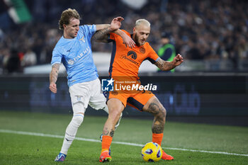 2023-12-17 - Nicolo' Rovella of Lazio vies for the ball with Federico Dimarco of Internazionale during the Italian championship Serie A football match between SS Lazio and FC Internazionale on December 17, 2023 at Stadio Olimpico in Rome, Italy - FOOTBALL - ITALIAN CHAMP - LAZIO V INTERNAZIONALE - ITALIAN SERIE A - SOCCER