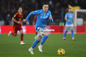 2023-12-23 - Piotr Zielinski of Napoli in action during the Italian championship Serie A football match between AS Roma and SSC Napoli on December 23, 2023 at Stadio Olimpico in Rome, Italy - FOOTBALL - ITALIAN CHAMP - ROMA V NAPOLI - ITALIAN SERIE A - SOCCER
