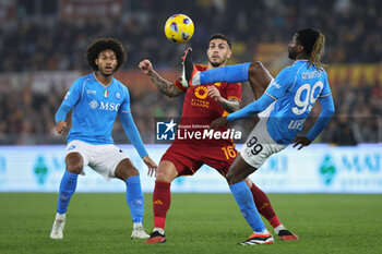 2023-12-23 - Leandro Paredes of Roma vies for the ball with Jens Cajuste and Andre' Anguissa of Napoli during the Italian championship Serie A football match between AS Roma and SSC Napoli on December 23, 2023 at Stadio Olimpico in Rome, Italy - FOOTBALL - ITALIAN CHAMP - ROMA V NAPOLI - ITALIAN SERIE A - SOCCER