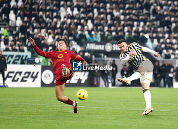 2023-12-30 - Filip Kostic of Juventus and Paolo Dybala of As Roma during the Italian Serie A, football match between Juventus Fc and As Roma on 30 December 2023 at Allianz Stadium, Turin, Italy. Photo Nderim Kaceli - JUVENTUS FC VS AS ROMA - ITALIAN SERIE A - SOCCER