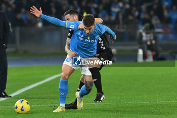 2023-12-29 - Giovanni Di Lorenzo of SSC Napoli competes for the ball with Matteo Pessina of AC Monza during Serie A between SSC Napoli vs AC Monza at Diego Armando Maradona Stadium - SSC NAPOLI VS AC MONZA - ITALIAN SERIE A - SOCCER