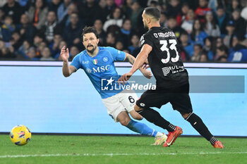 2023-12-29 - Danilo D'Ambrosio of AC Monza competes for the ball with Mario Rui of SSC Napoli during Serie A between SSC Napoli vs AC Monza at Diego Armando Maradona Stadium - SSC NAPOLI VS AC MONZA - ITALIAN SERIE A - SOCCER