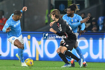 2023-12-29 - Juan Jesus of SSC Napoli competes for the ball with Andrea Colpani of AC Monza during Serie A between SSC Napoli vs AC Monza at Diego Armando Maradona Stadium - SSC NAPOLI VS AC MONZA - ITALIAN SERIE A - SOCCER