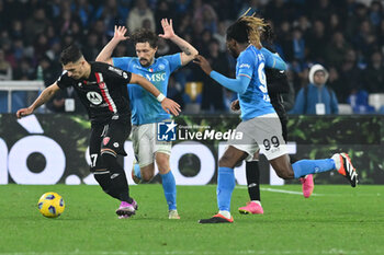 2023-12-29 - Dany Mota of AC Monza competes for the ball with Mario Rui of SSC Napoli during Serie A between SSC Napoli vs AC Monza at Diego Armando Maradona Stadium - SSC NAPOLI VS AC MONZA - ITALIAN SERIE A - SOCCER
