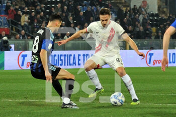 2023-02-24 - Filippo Lorenzo  Sgarbi (Perugia) thwarted by Marius Marin (Pisa) - AC PISA VS AC PERUGIA - ITALIAN SERIE B - SOCCER