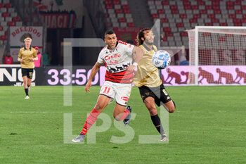 2023-03-01 - Waild Cheddira (SSC Bari) and Gianluca Busio (Venezia FC) - SSC BARI VS VENEZIA FC - ITALIAN SERIE B - SOCCER