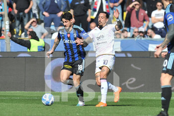 2023-03-04 - Giuseppe Mastinu (Pisa) thwarted by Francesco  Di Mariano (Palermo) - AC PISA VS PALERMO FC - ITALIAN SERIE B - SOCCER
