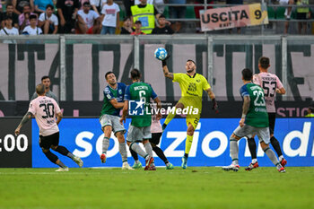 2023-09-02 - Palermo F.C.’s Mirko Pigliacelli saves the ball during the Italian Serie BKT soccer match SSC Palermo F.C. vs. Feralpisalo at the Renzo Barbera Stadium, Palermo, Italy, 2nd of September 2023 - PALERMO FC VS FERALPISALò - ITALIAN SERIE B - SOCCER