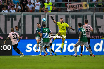2023-09-02 - Palermo F.C.’s Mirko Pigliacelli saves the ball during the Italian Serie BKT soccer match SSC Palermo F.C. vs. Feralpisalo at the Renzo Barbera Stadium, Palermo, Italy, 2nd of September 2023 - PALERMO FC VS FERALPISALò - ITALIAN SERIE B - SOCCER