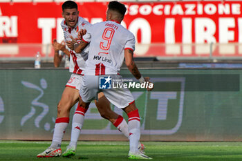 2023-09-24 - Ilias Koutsoupias (SSC Bari) celebrates after scoring a goal with Marco Nasti (SSC Bari) - SSC BARI VS US CATANZARO - ITALIAN SERIE B - SOCCER