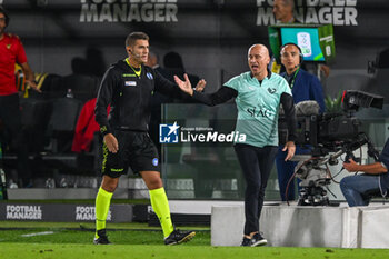 2023-09-26 - Eugenio Corini head coach of Palermo F.C. shows his disappointment to the fourth offical during the Italian Serie BKT soccer match Venezia F.C. vs. Palermo F.C. at the Pier Luigi Penzo Stadium, Venice, Italy, 26th of September 2023 - VENEZIA FC VS PALERMO FC - ITALIAN SERIE B - SOCCER