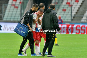 2023-10-21 - Raffaele Maiello of SSC Bari injured - SSC BARI VS MODENA FC - ITALIAN SERIE B - SOCCER