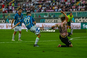 2023-10-29 - Lecco 1912’s Nicolo Buso in action against Palermo F.C.’s Kristoffer Lund during the Italian Serie BKT soccer match Palermo F.C. vs. LEcco 1912 at the Renzo Barbera Stadium, Palermo, Italy, 29th of October 2023 - PALERMO FC VS LECCO 1912 - ITALIAN SERIE B - SOCCER
