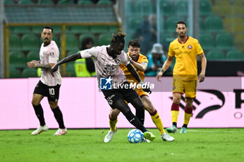 2023-11-12 - Mamadou Coulibaly (Palermo F.C.) in action against Simone Branca (A.S. Cittadella) during the Italian Serie BKT match between Palermo F.C. vs Cittadella on 2th November 2023 at the Renzo Barbera stadium in Palermo, Italy - PALERMO FC VS AS CITTADELLA - ITALIAN SERIE B - SOCCER