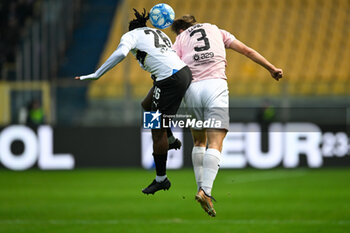 2023-12-10 - Kristoffer Lund (Palermo F.C.) in action against Woyo Coulibaly (Parma Calcio) during the Italian Serie BKT match between Parma Calcio vs. Palermo F.C. at the Ennio Tardini Stadium in Parma, Italy - PARMA CALCIO VS PALERMO FC - ITALIAN SERIE B - SOCCER