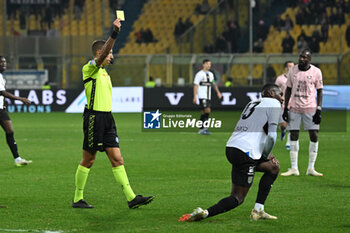 2023-12-10 - Yellow card for Ange-Yoan Bonny (Parma Calcio) during the Italian Serie BKT match between Parma Calcio vs. Palermo F.C. at the Ennio Tardini Stadium in Parma, Italy - PARMA CALCIO VS PALERMO FC - ITALIAN SERIE B - SOCCER