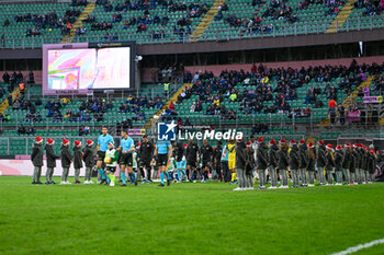 2023-12-16 - Palermo F.C. and Pisa U.S. 1909 enters the field during the Italian Serie BKT match between Palermo F.C. vs. Pisa U.S. 1909 at the Renzo Barbera Stadium in Palermo, Italy - PALERMO FC VS AC PISA - ITALIAN SERIE B - SOCCER
