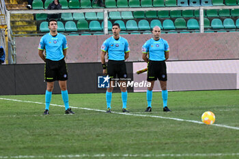 2023-12-16 - Arbitration Terna under the Lega Serie B Series alined up for a minute of recollection to honor the passing of Enrico Cannata during the Italian Serie BKT match between Palermo F.C. vs. Pisa U.S. 1909 at the Renzo Barbera Stadium in Palermo, Italy - PALERMO FC VS AC PISA - ITALIAN SERIE B - SOCCER