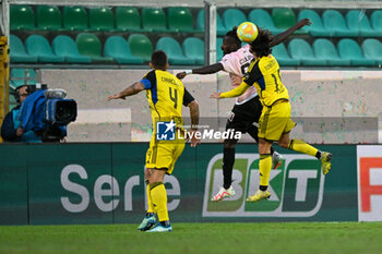 2023-12-16 - Mamadou Coulibaly (Palermo F.C.) in action against Tomas Esteves (Pisa S.C. 1909) during the Italian Serie BKT match between Palermo F.C. vs. Pisa U.S. 1909 at the Renzo Barbera Stadium in Palermo, Italy - PALERMO FC VS AC PISA - ITALIAN SERIE B - SOCCER