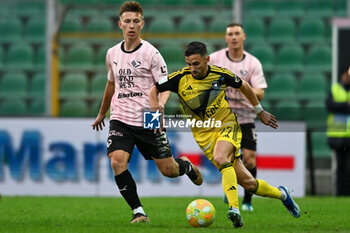 2023-12-16 - Marco D'Alessandro (Pisa S.C. 1909) and Kristoffer Lund (Palermo F.C.) during the Italian Serie BKT match between Palermo F.C. vs. Pisa U.S. 1909 at the Renzo Barbera Stadium in Palermo, Italy - PALERMO FC VS AC PISA - ITALIAN SERIE B - SOCCER