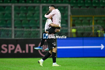 2023-12-16 - Roberto Insigne (Palermo F.C.) hugs Jacopo Segre (Palermo F.C.) after the lastone scores a goal during the Italian Serie BKT match between Palermo F.C. vs. Pisa U.S. 1909 at the Renzo Barbera Stadium in Palermo, Italy - PALERMO FC VS AC PISA - ITALIAN SERIE B - SOCCER