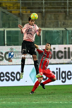 2023-12-26 - Edoardo Soleri (Palermo F.C.) overhead kick the ball against Luca Ravanelli (U.S. Cremonese) during the Italian Serie BKT match between Palermo F.C. vs. U.S. Cremonese at the Renzo Barbera Stadium in Palermo, Italy - PALERMO FC VS US CREMONESE - ITALIAN SERIE B - SOCCER