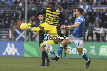 2023-12-26 - Wylan Cyprien of Parma Calcio  battle for the ball with Gabriele Moncini of Brescia FC during Brescia FC vs Parma Calcio, 19° Serie BKT 2023-24 game at Mario Rigamonti stadium in Brescia, Italy, on Dicember 26, 2023. - BRESCIA CALCIO VS PARMA CALCIO - ITALIAN SERIE B - SOCCER