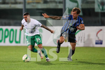 2023-05-11 - Pasquale Giannotti (#24 - Monopoli) vies the ball with Eros De Santis (#13 - Latina Calcio) - MONOPOLI VS LATINA - ITALIAN SERIE C - SOCCER