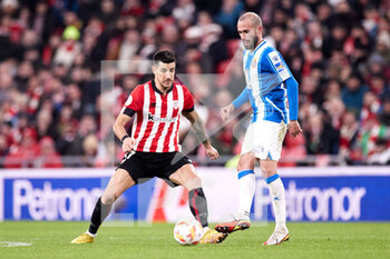 2023-01-18 - Aleix Vidal of RCD Espanyol competes for the ball with Yuri Berchiche of Athletic Club during the Spanish Cup, Copa del Rey, Round of 16 football match between Athletic Club and RCD Espanyol on January 18, 2023 at San Mames stadium in Bilbao, Spain - FOOTBALL - SPANISH CUP - ATHLETIC CLUB V ESPANYOL - SPANISH CUP - SOCCER