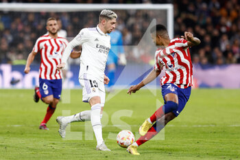 2023-01-27 - Federico Valverde of Real Madrid and Reinildo Mandava of Atletico de Madrid during the Spanish cup, Copa del Rey, Quarter Finals football match between Real Madrid and Atletico de Madrid on January 26, 2023 in Madrid, Spain - FOOTBALL - SPANISH CUP - REAL MADRID V ATLETICO MADRID - SPANISH CUP - SOCCER