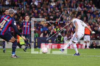 2023-04-05 - Karim Benzema of Real Madrid scores a goal 0-2 during the Spanish Cup, Copa del Rey, Semi Finals 2nd leg football match between FC Barcelona and Real Madrid on April 5, 2023 at Spotify Camp Nou stadium in Barcelona, Spain - FOOTBALL - SPANISH CUP - FC BARCELONA V REAL MADRID - SPANISH CUP - SOCCER