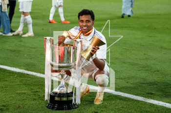 2023-05-07 - Rodrygo Goes of Real Madrid celebrates with the Champions trophy after the Spanish Cup, Copa del Rey, Final football match between Real Madrid CF and CA Osasuna on May 6, 2023 at Estadio de La Cartuja in Sevilla, Spain - FOOTBALL - SPANISH CUP - FINAL - REAL MADRID V OSASUNA - SPANISH CUP - SOCCER