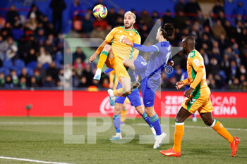 2023-01-28 - Enes Unal of Getafe and German Pezzella of Real Betis during the Spanish championship La Liga football match between Getafe CF and Real Betis Balompie on January 28, 2023 at Coliseum Alfonso Perez in Getafe, Madrid, Spain - FOOTBALL - SPANISH CHAMP - GETAFE V REAL BETIS - SPANISH LA LIGA - SOCCER