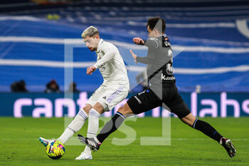 2023-01-29 - Federico Valverde of Real Madrid and Marin Zubimendi of Real Sociedad during the Spanish championship La Liga football match between Real Madrid and Real Sociedad on January 29, 2023 at Santiago Bernabeu stadium in Madrid, Spain - FOOTBALL - SPANISH CHAMP - REAL MADRID V REAL SOCIEDAD - SPANISH LA LIGA - SOCCER