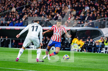2023-02-25 - Reinildo (Atletico Madrid) in action during the football match between
Real Madrid and Atletico Madrid called “El Derby” valid for the matchday 23 of La Liga celebrated in Madrid, Spain at Bernabeu stadium on Saturday 25 February 2023 - REAL MADRID VS ATLETICO MADRID - SPANISH LA LIGA - SOCCER