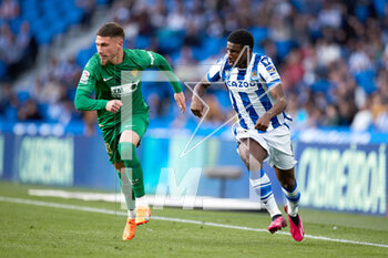 2023-03-19 - Jose Angel Carmona of Elche CF and Mohamed-Ali Cho of Real Sociedad during the Spanish championship La Liga football match between Real Sociedad and Elche CF on March 19, 2023 at Reale Area in San Sebastian, Spain - FOOTBALL - SPANISH CHAMP - REAL SOCIEDAD V ELCHE - SPANISH LA LIGA - SOCCER