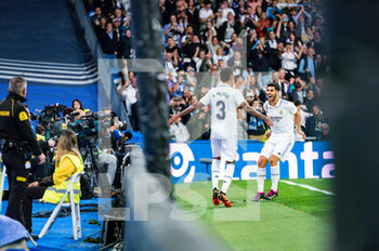 2023-04-22 - Éder Militão (Real Madrid) and Marco Asensio (Real Madrid) celebrate a goal during the football match between
Real Madrid and Celta Vigo
valid for the match day 30 of the Spanish first division league “La Liga” celebrated in Madrid, Spain at Bernabeu stadium on Saturday 22 April 2023 - REAL MADRID VS CELTA VIGO - SPANISH LA LIGA - SOCCER