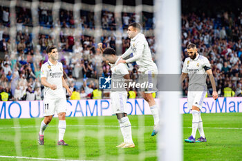 2023-05-24 - Rodrygo (Real Madrid) with Marco Asensio (Real Madrid), Dani Ceballos (Real Madrid), Karim Benzema (Real Madrid) celebrate his goal during the football match between
Real Madrid and Rayo Vallecano
valid for the match day 36 of the Spanish first division league “La Liga” celebrated in Madrid, Spain at Bernabeu stadium on Wednesday 24 May 2023 - REAL MADRID VS RAYO VALLECANO - SPANISH LA LIGA - SOCCER