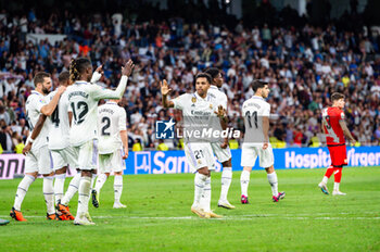 2023-05-24 - Rodrygo (Real Madrid) with Eduardo Camavinga (Real Madrid) celebrate his goal during the football match between
Real Madrid and Rayo Vallecano
valid for the match day 36 of the Spanish first division league “La Liga” celebrated in Madrid, Spain at Bernabeu stadium on Wednesday 24 May 2023 - REAL MADRID VS RAYO VALLECANO - SPANISH LA LIGA - SOCCER