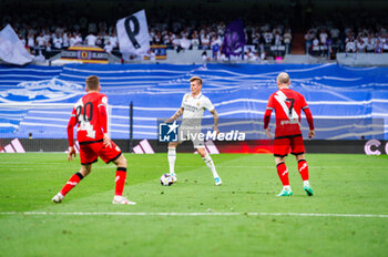 2023-05-24 - Toni Kroos (Real Madrid) in action during the football match between
Real Madrid and Rayo Vallecano
valid for the match day 36 of the Spanish first division league “La Liga” celebrated in Madrid, Spain at Bernabeu stadium on Wednesday 24 May 2023 - REAL MADRID VS RAYO VALLECANO - SPANISH LA LIGA - SOCCER