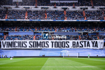 2023-05-24 - Real Madrid fans display banner in support of Real Madrid player Vinicius Junior during the Spanish championship La Liga football match between Real Madrid and Rayo Vallecano on May 24, 2023 at Santiago Bernabeu stadium in Madrid, Spain - FOOTBALL - SPANISH CHAMP - REAL MADRID V RAYO VALLECANO - SPANISH LA LIGA - SOCCER