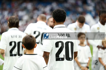 2023-05-24 - Players of Real Madrid wear a T-Shirt with the name of Vinicius Junior for support against racism during the Spanish championship La Liga football match between Real Madrid and Rayo Vallecano on May 24, 2023 at Santiago Bernabeu stadium in Madrid, Spain - FOOTBALL - SPANISH CHAMP - REAL MADRID V RAYO VALLECANO - SPANISH LA LIGA - SOCCER