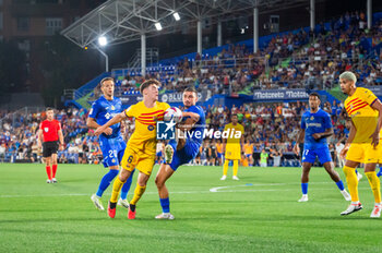 2023-08-13 - Gavi (Barcelona) 
during the controversial play with the alleged handball sanctioned by the var at the end of the LaLiga EA Sports football match between Getafe and Barcelona played at Coliseum Alfonso Perez Stadium on August 13, 2023 in Getafe, Spain - GETAFE VS BARCELONA - SPANISH LA LIGA - SOCCER